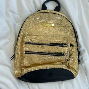 Mini gold Steve Madden backpack